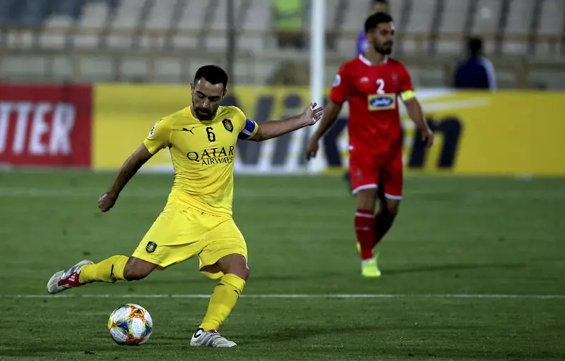 Xavi Hernández: Kiến Trúc Sư Vĩ Đại Của Tuyệt Phẩm Tiki-Taka 3 Xavi Hernández Xavi Hernández trong màu áo Al-Sadd phần 4